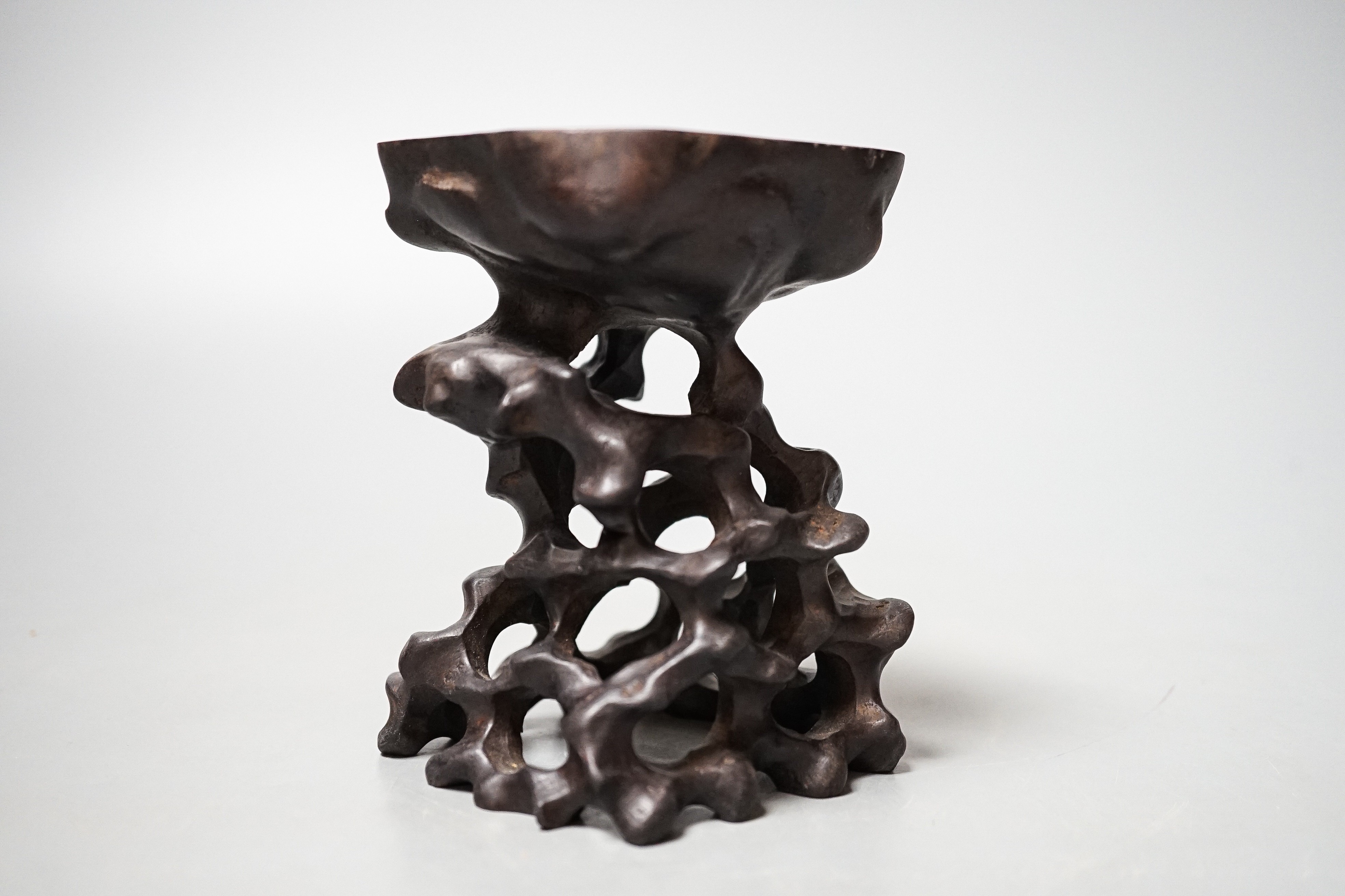A Chinese carved hardwood stand 10.5cm